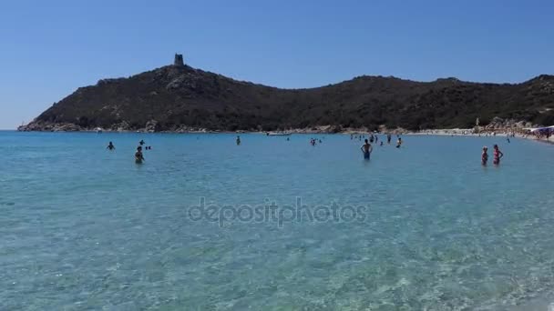 White Sand Beach And Tourists People Swimming In Sardinia Italy - Кадри, відео