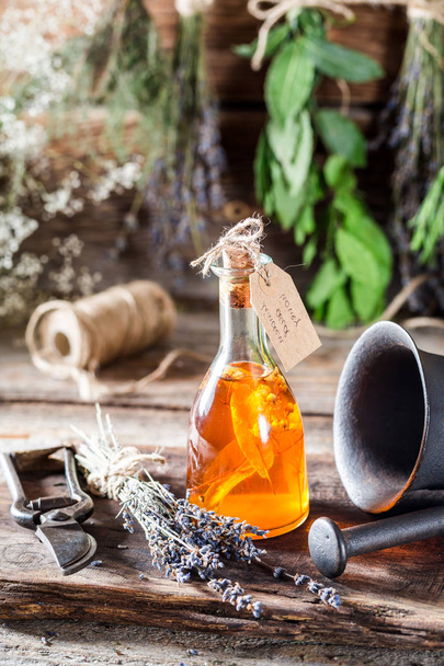 Aromatic tincture as natural medicine with herbs - Fotoğraf, Görsel