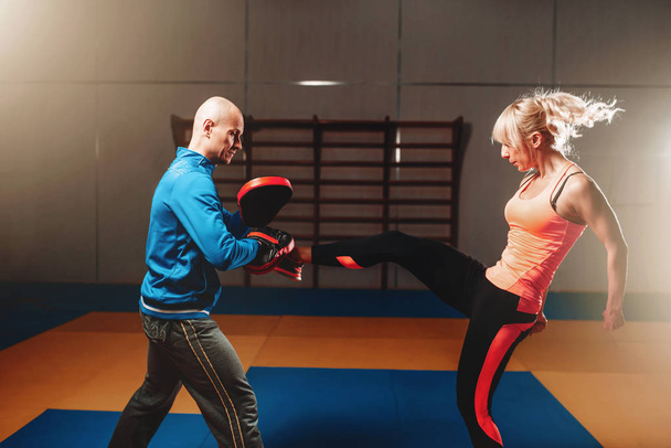 self-defense workout with personal trainer - Photo, Image