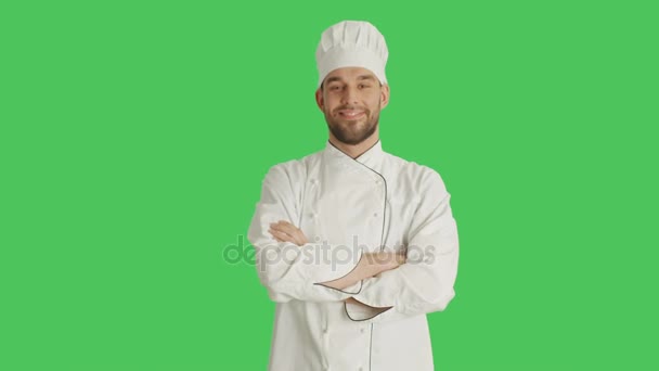 Mid Shot of a Handsomer Chef Crossing His Arms and Smiling. Background is Green Screen. - Metraje, vídeo