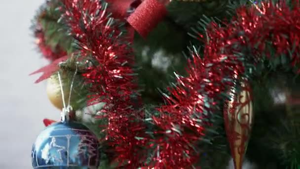 Decorated Christmas tree with toys and balls, close-up. - Filmmaterial, Video
