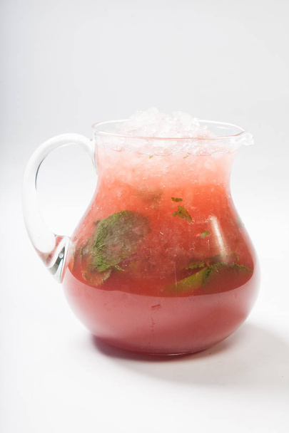 Homemade strawberry lemonade in a glass jug - Foto, Imagem