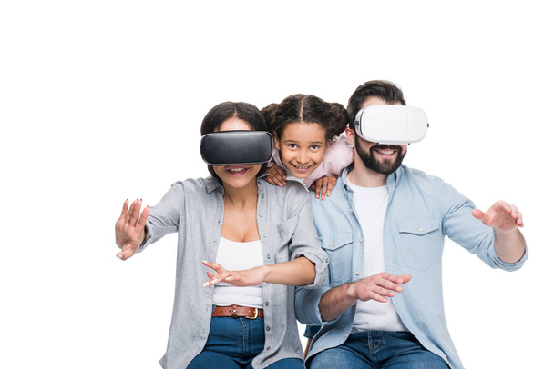 Family in virtual reality headsets  - Fotó, kép