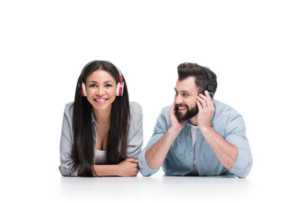 Happy young couple in headphones  - 写真・画像