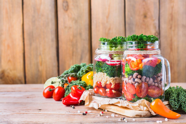 Healthy vegan salad in a mason jar with beans - Photo, Image
