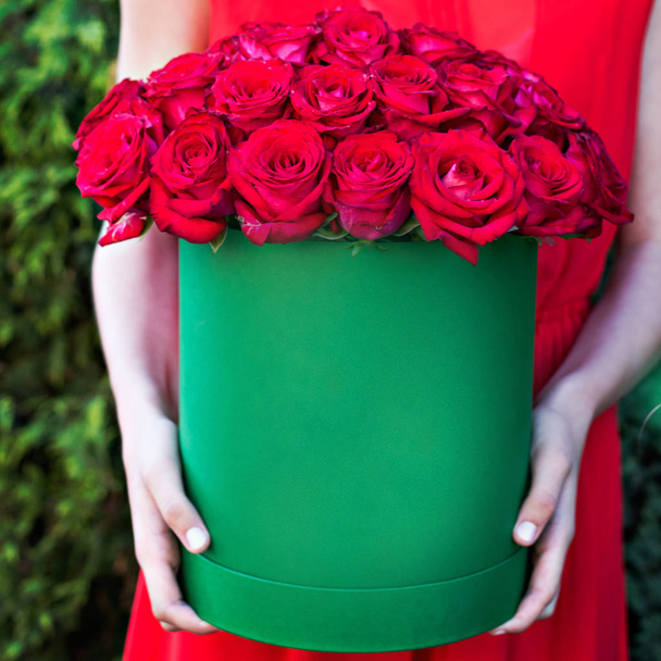 A bouquet of red roses in a box - Photo, Image
