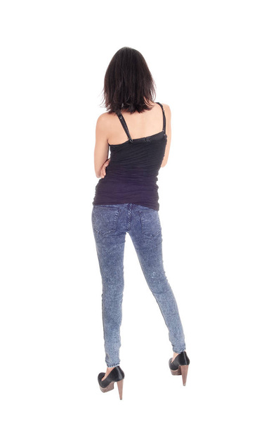 Woman standing in tights from the back. - Foto, imagen
