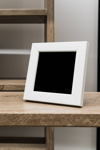 Black space on white wooden frame - Foto, imagen
