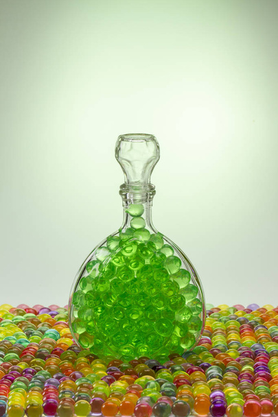 Carafe with colored balls - Photo, image