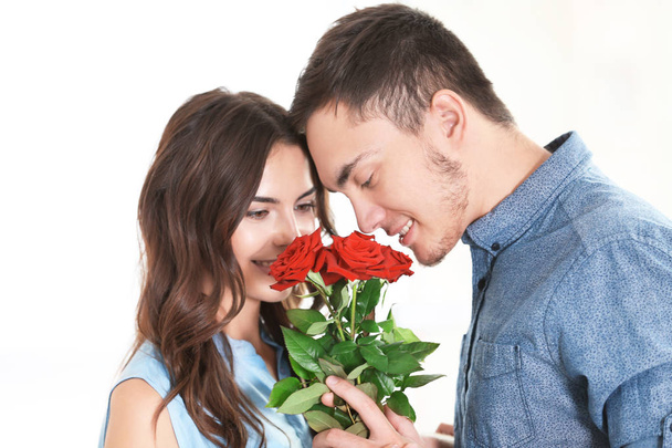 Beautiful couple with bouquet - Zdjęcie, obraz