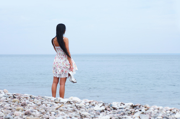 Young beautiful woman near the sea - Foto, Imagem