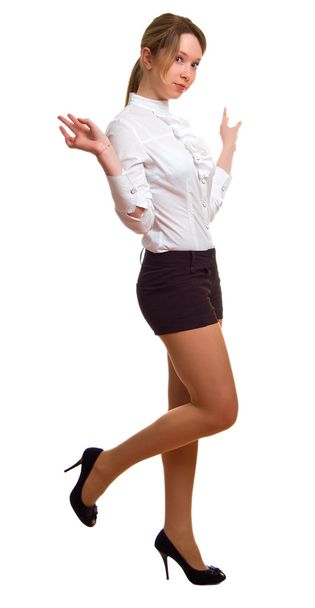 Girl in a white shirt and black shorts - Foto, afbeelding