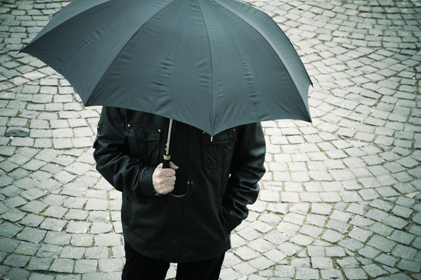 man with umbrella - Foto, Imagen