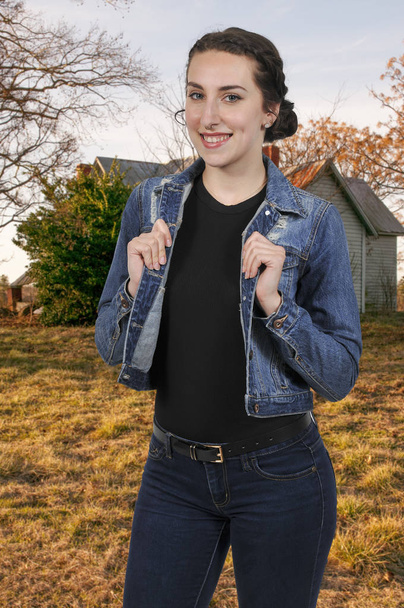 Woman wearing jeans and denim jacket - Φωτογραφία, εικόνα