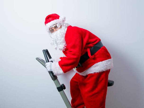 Santa Claus bavit se s rotopedy - Fotografie, Obrázek