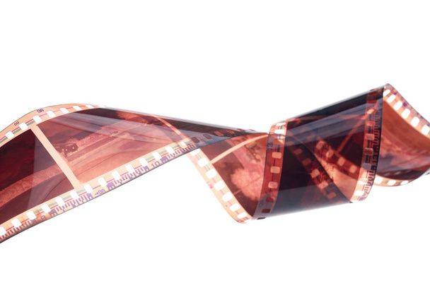 Film strip roll over white background. - Photo, Image