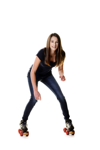 teen girl trying to roller skate - Photo, image