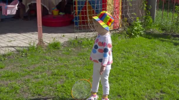 Girl with badminton rackets - Záběry, video