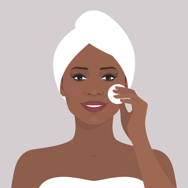 Avatar portret piękne african american kobieta czyszczenie twarzy z wacikiem. Ilustracja wektorowa uśmiechający się kobiety z ręcznikiem na głowie. Uroda i zdrowie. Płaska konstrukcja.  - Wektor, obraz