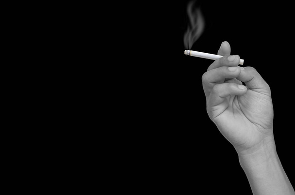 Sigaretta maschio tenuta a mano
 - Foto, immagini