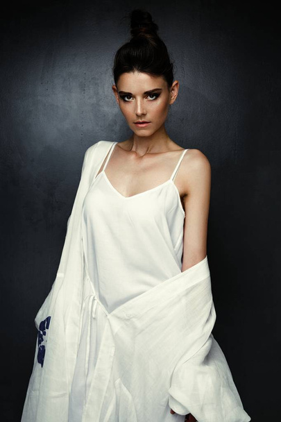 attractive young woman  in white dress - Φωτογραφία, εικόνα