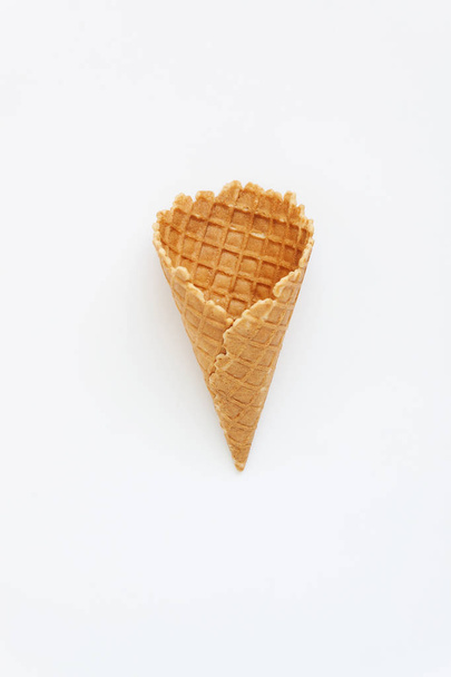 One waffle cone, top view, isolated on white background - 写真・画像