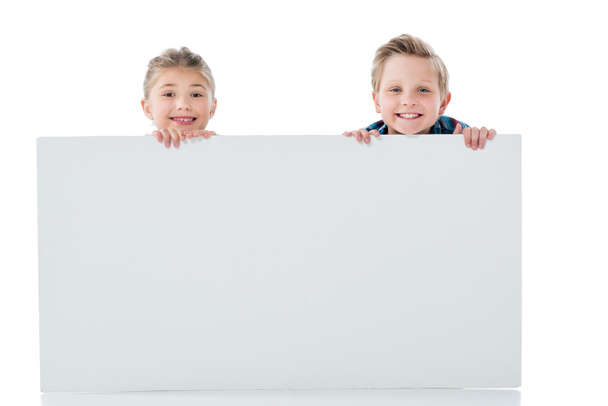 Cute kids with blank banner  - Zdjęcie, obraz