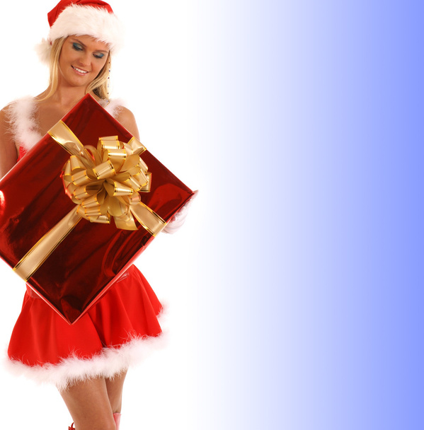 Young sexy Santa with a big present - Foto, imagen