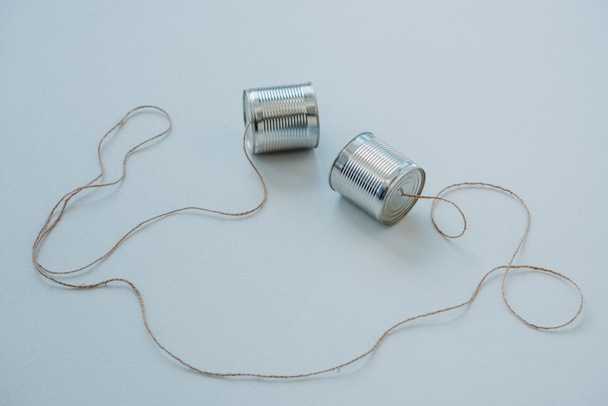 aluminium tin cans connected with rope - Photo, Image