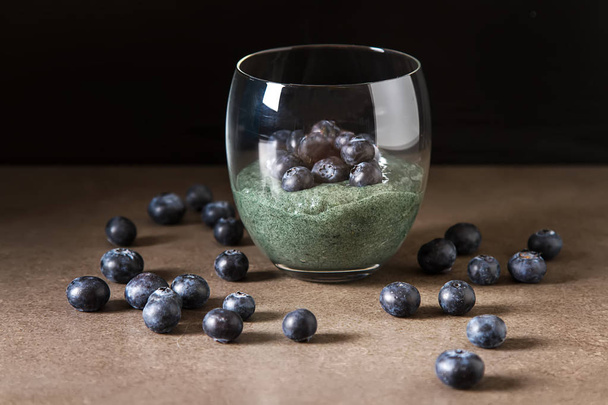 Fresh juicy bluesberries spirulina smoothies in the glass. Simpl - Фото, зображення
