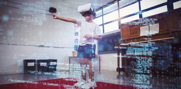 boy wearing virtual reality 3D simulator dancing at home - Fotó, kép