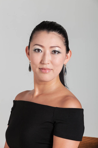 Elegant Asian woman in studio, portrait - Photo, image