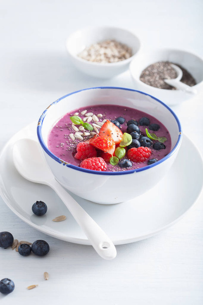 healthy berry smoothie bowl with strawberry blueberry raspberry  - Zdjęcie, obraz