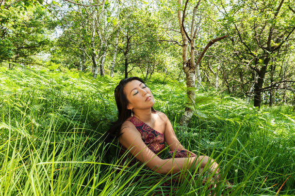 Asian girl portrait outdoors in the forest - Foto, Imagen