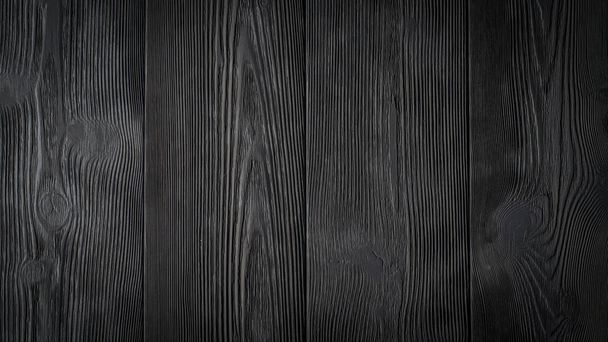 the black background of wooden boards. - Photo, image