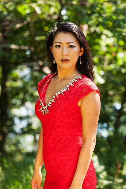 Sexy Asian woman with red dress - Foto, imagen