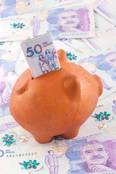 Saving Fifty Thousand Colombian Pesos Bills - Photo, Image