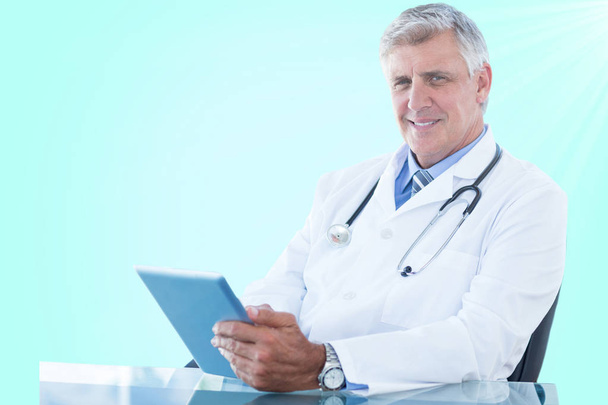 Composite 3d image of portrait of confident male doctor using digital tablet - Foto, afbeelding