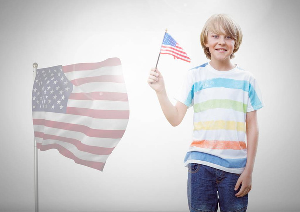 Child holding american flag  - Фото, зображення