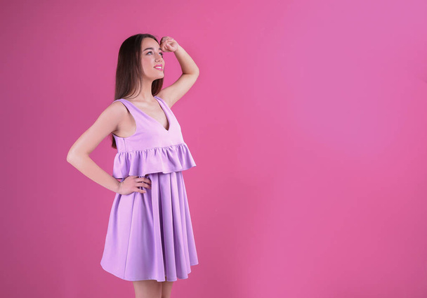 young woman in lilac dress  - Foto, Imagen