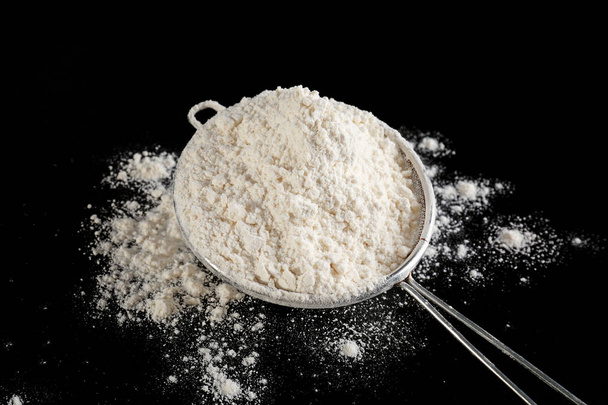 Sieve with flour  - Foto, afbeelding