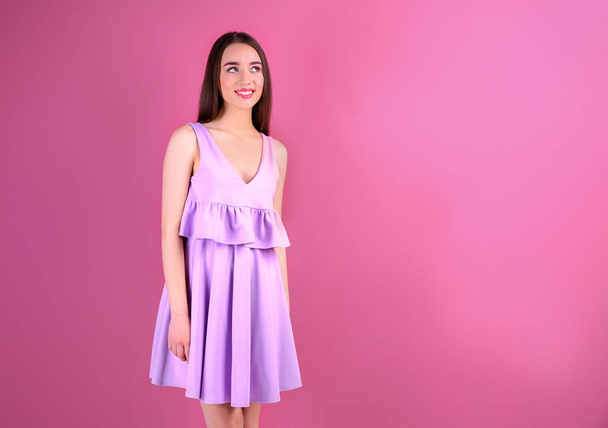 young woman in lilac dress  - Foto, Imagen