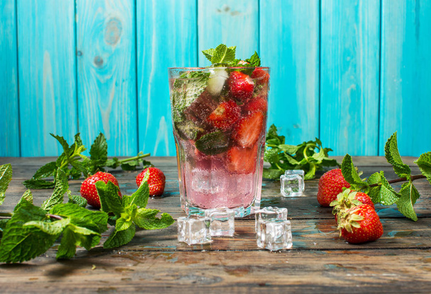 Strawberry mojito and ingredients on rustic background - Photo, Image