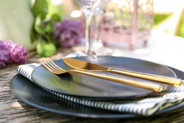 Table setting with golden cutlery - Φωτογραφία, εικόνα