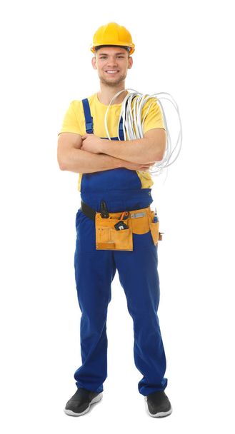 young electrician with bunch of wires  - Foto, afbeelding