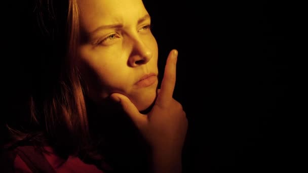 Portrait of a pensive smiling teen girl 4K - Felvétel, videó