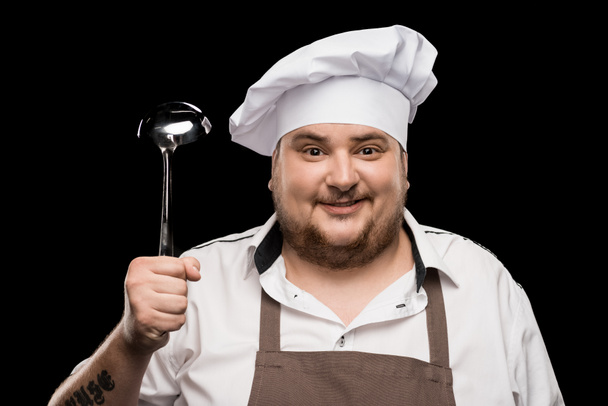 Professional chef with scoop  - Photo, Image