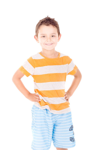 Boy wearing blue beach shorts  - Фото, изображение