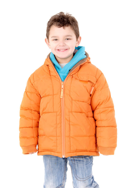 Cheerful boy in orange jacket  - Zdjęcie, obraz