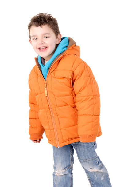 Cheerful boy in orange jacket  - 写真・画像